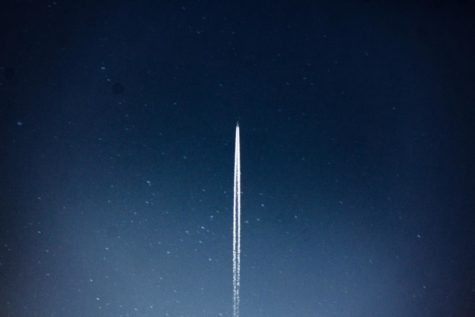 A space shuttle (not Artemis) launching at night.