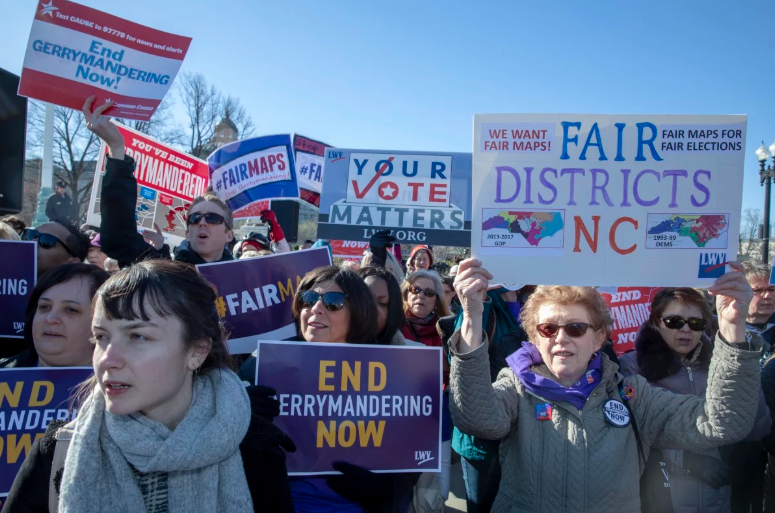 Citizens protest against the redrawing of voting maps to benefit one political party over another in elections outside the U.S. Supreme Court in Washington, D.C., in 2019.(Image from NPR)